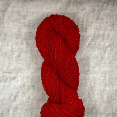Wild Atlantic | Eriu | Super Soft Merino, Colour: Poppy, Ériu ("air-oo") is a super soft merino yarn. The boucle texture makes it incredibly versatile, allowing it to be a substitute yarn in patterns calling for DK or worsted weights, adding a beautiful n