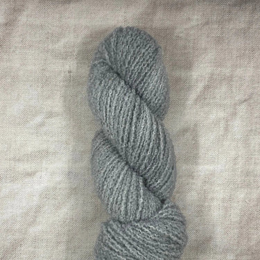 Wild Atlantic | Eriu | Super Soft Merino, Colour: Quartzite, Ériu ("air-oo") is a super soft merino yarn. The boucle texture makes it incredibly versatile, allowing it to be a substitute yarn in patterns calling for DK or worsted weights, adding a beautif
