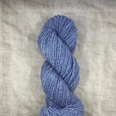 Wild Atlantic | Eriu | Super Soft Merino, Colour: Wisteria, Ériu ("air-oo") is a super soft merino yarn. The boucle texture makes it incredibly versatile, allowing it to be a substitute yarn in patterns calling for DK or worsted weights, adding a beautifu