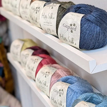 Gepard HorSilke balls of yarn on shelf in Knit With Me yarn shop