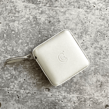 ChiaoGoo Retractable Tape Measure, white square design, measures 150cm, ideal for knitting and crochet projects, compact and efficient.