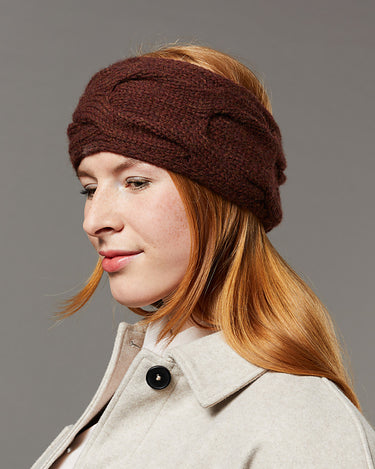 ilma headband on a person at knit with me yarn shop