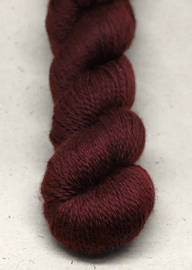 John Arbon | Knit By Numbers | British Yarn, Colour: Burgandy 74, This base has lustre and drape, but still packed with crisp stitch definition and soft enough to wear next to the skin. With an innovative colour palette providing the precise shade. Each c
