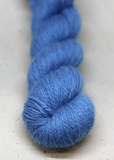 John Arbon | Knit By Numbers | British Yarn, Colour: Denim 83, This base has lustre and drape, but still packed with crisp stitch definition and soft enough to wear next to the skin. With an innovative colour palette providing the precise shade. Each colo