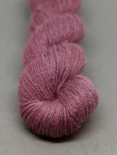 John Arbon | Knit By Numbers | British Yarn, Colour: Raspberry Pink 132, This base has lustre and drape, but still packed with crisp stitch definition and soft enough to wear next to the skin. With an innovative colour palette providing the precise shade.