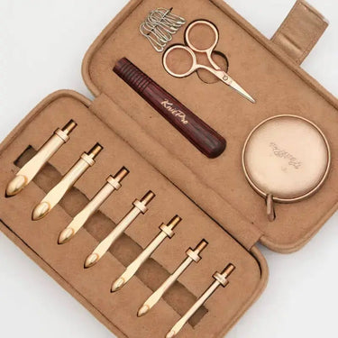 KnitPro Oasis Chunky Interchangeable Crochet Hook Set with 7 hooks, scissors, tape measure, and markers.