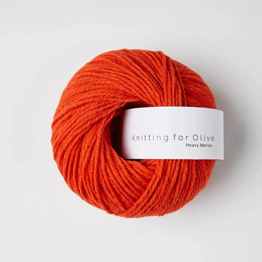 Knitting for Olive Heavy Merino yarn ball in vibrant orange color, 100% premium New Zealand merino wool.