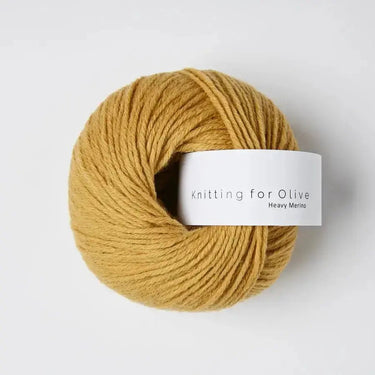 Knitting for Olive Heavy Merino yarn in natural mustard color, 100% Merino wool sourced from New Zealand, ideal for cozy knitting projects.