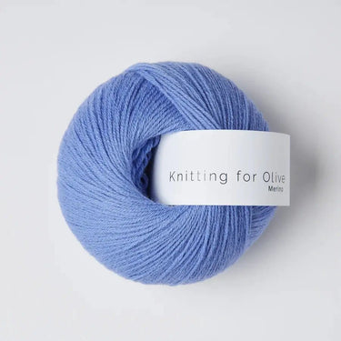 Knitting For Olive Merino yarn in soft blue, ideal for knitting warm and cozy garments.