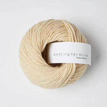 Knitting For Olive Merino yarn skein, fingering weight, natural fibers, ideal for hiking and camping in winter, enhances comfort.