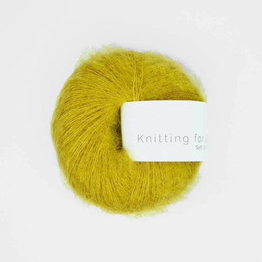 Knitting For Olive Soft Silk Mohair yarn in yellow color, luxurious blend of Kid Mohair and Mulberry silk, perfect for knitting projects.