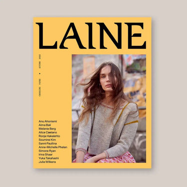 Magazine cover with a person wearing a sweater on a yellow background
