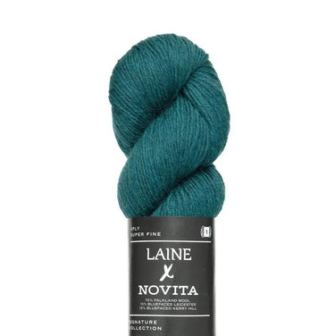 Teal skein of yarn with Laine Novita label on a white background