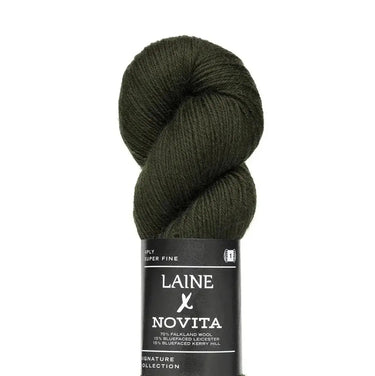 Dark green skein of yarn with Laine Novita label on a white background