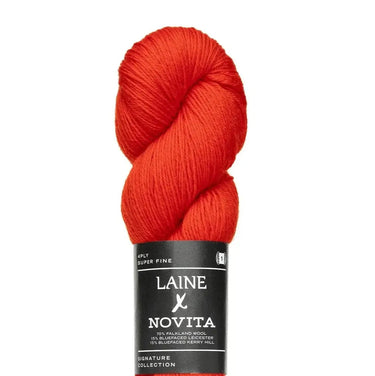 Red skein of yarn with a Laine Novita label on a white background