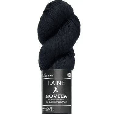 Dark blue skein of yarn with 'Laine Novita' label on a white background