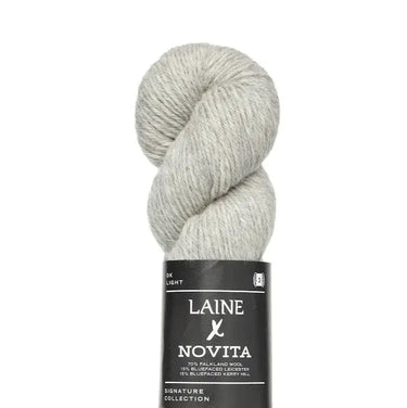 Laine x Novita DK yarn skein, blending British fibres for quality knitting projects.