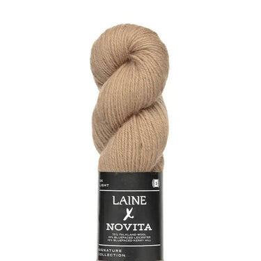 Alt Tag: Laine x Novita DK yarn skein in natural color, featuring high-quality British fibres for double knitting projects.