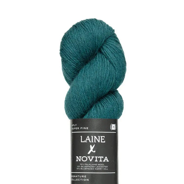 Teal skein of yarn with Laine Novita label on a white background