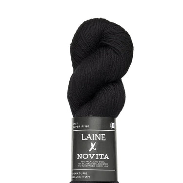 Black skein of yarn with a Novita label on a white background