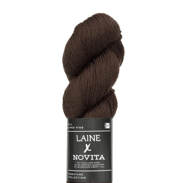 Brown skein of yarn with Laine Novita label on a white background