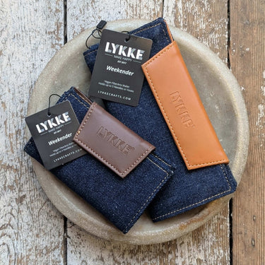 Lykke Weekender Knitting Needle Travel Case in denim and vegan leather, perfect for organizing knitting tools on the go.