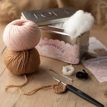 TOFT Doughnuts Crochet Kit | Amigurumi Food in a Tin, , Crochet 4 doughnuts or 1 cute character with TOFT’s gourmet kit. Includes UK-spun yarn, tools & recipe pattern in a keepsake tin., Knit With Me