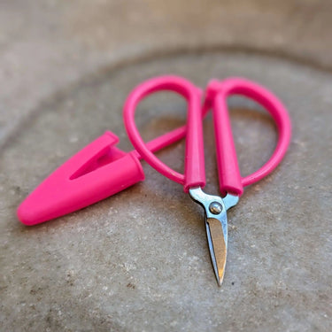 Fox & Pine Mini Scissors in pink with silicone cover; sharp, compact, ideal for travel. Measures 2.5" long. Available in three colors.
