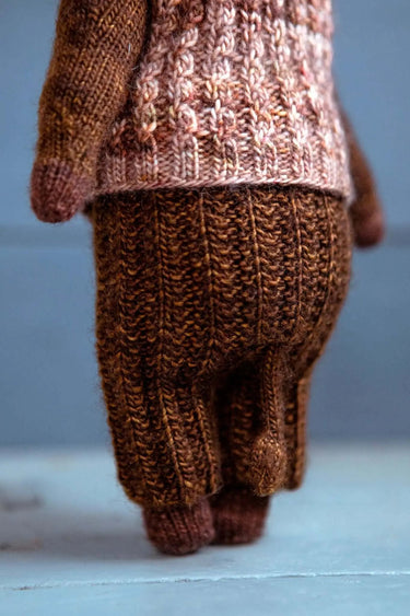 Laine | Mouche & Friends | Seamless Knitted Toy Patterns, , Knit 12 adorable toy animals with clothes in Mouche & Friends. A seamless knitting journey with stories, tutorials, and charming character design., Knit With Me