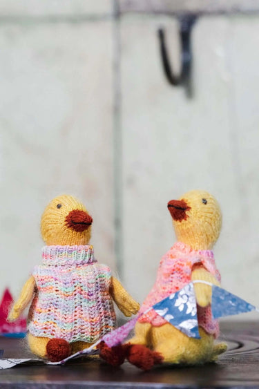 Laine | Mouche & Friends | Seamless Knitted Toy Patterns, , Knit 12 adorable toy animals with clothes in Mouche & Friends. A seamless knitting journey with stories, tutorials, and charming character design., Knit With Me