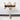 KnitPro Natural Wood Yarn Swift with a skein of yarn wound on, clamped to a table | Knit With Me