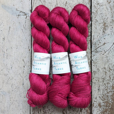 Wild Atlantic | Niamh | Merino & Silk Yarn, Colour: Very Berry, A luxurious blend of silk and merino combined to produce this beautifully soft base. Niamh means lustre, radiance and brightness which is this sumptuous yarn. With wonderful stitch definition