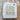Norah Sock Kit by Marie Wallin tote bag with Fairisle design on wooden background