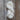 Noro Haunui Silk yarn skein, blend of natural mulberry silk and Haunui merino wool, undyed skien, on rustic wooden background
