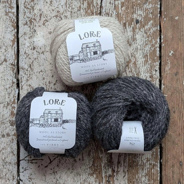 Three balls of Lore wool yarn in different shades, perfect for the Pochie Hot Water Bottle Knitting Kit by Kate Davies.