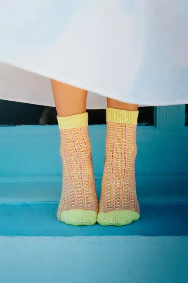 PomPom Issue 44: Spring 2023, , You never know what the day will bring with spring, so it’s the perfect season for layering! All of the pieces in this issue play with opacity, texture, and colourwork, layering techniques, tones, and transparency - sometim