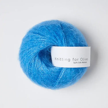 Knitting For Olive | Soft Silk Mohair, colour: Poppy Blue, A luxurious mohair yarn blend. Finest Kid Mohair and Mulberry silk fingering yarn. This yarn is incredible held double or with Knitting For Olive Merino, Knit With Me