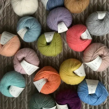 Snefnug in a group of different colours at Knit With Me yarn shop
