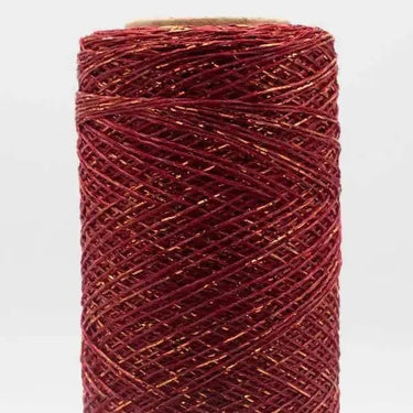 Luxurious red metallic yarn spool, Stellaris by Kremke Soul Wool, for elegant knit and crochet projects with subtle shimmer.