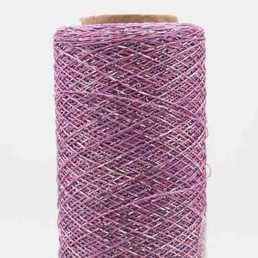 Stellaris - Kremke Soul Wool metallic yarn in pink, adds glamour and shimmer to knit creations, enhancing elegance with subtle sparkle.