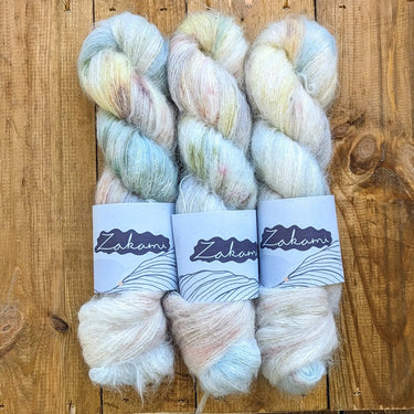 Zakami | Suri Fluff Lace | Baby Suri Alpaca & Silk Yarn, Colour: Exordium, This incredibly soft blend of Baby Suri Alpaca and Silk is an absolute dream. So very soft and light. It can be used on it's own or held together with a strand of heavier weight ya