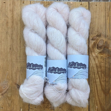 Zakami | Suri Fluff Lace | Baby Suri Alpaca & Silk Yarn, Colour: Pink Cadalac, This incredibly soft blend of Baby Suri Alpaca and Silk is an absolute dream. So very soft and light. It can be used on it's own or held together with a strand of heavier weigh