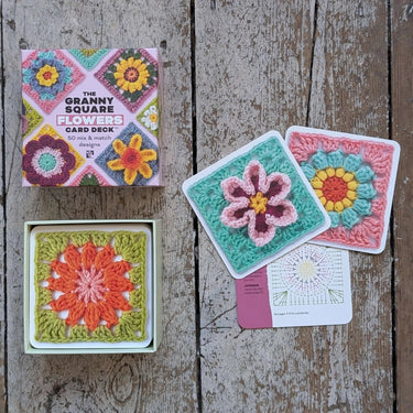 Granny Square Flowers Card Deck with crochet designs on rustic wood background.