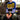 Person wearing a colorful striped sweater sitting outdoors. Tukubook knitting book