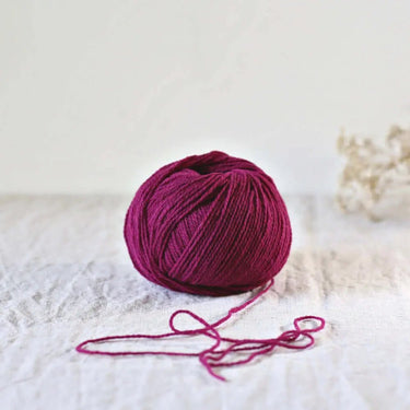 Ulysse Yarn | De Rerum Natura (Sport Weight) in Confiture De Rose colour at Knit With Me yarn shop