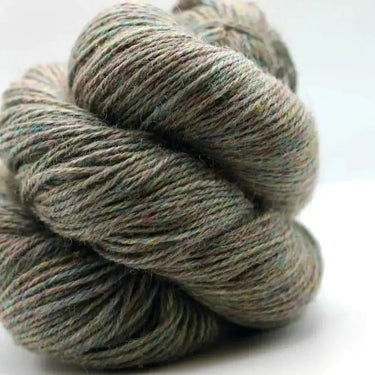 Yarnadelic Sport yarn made from 100% Falklands Corriedale wool, showcasing its rich texture and natural fibers in a heathered hue.