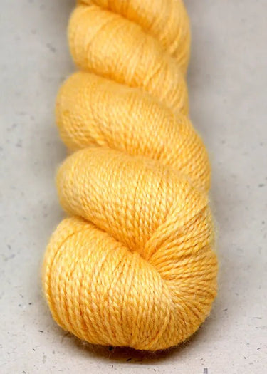 John Arbon | Knit By Numbers | British Yarn, Colour: Sunshine Yellow 101, This base has lustre and drape, but still packed with crisp stitch definition and soft enough to wear next to the skin. With an innovative colour palette providing the precise shade