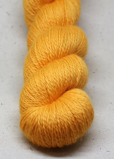 John Arbon | Knit By Numbers | British Yarn, Colour: Sunshine Yellow 98, This base has lustre and drape, but still packed with crisp stitch definition and soft enough to wear next to the skin. With an innovative colour palette providing the precise shade.