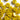 Yellow buttons with a textured surface on a white background