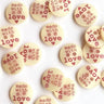Round wooden tokens with 'made with love' text on a white background